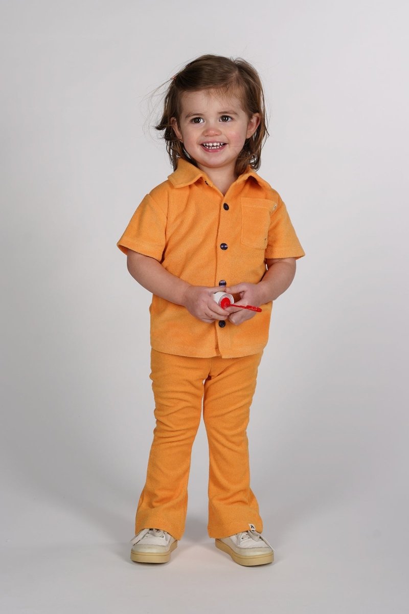 Nena flared broek oranje Birdie - The New Chapter Store